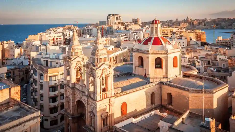 European Union flag with Malta passport symbolizing the golden passport ban